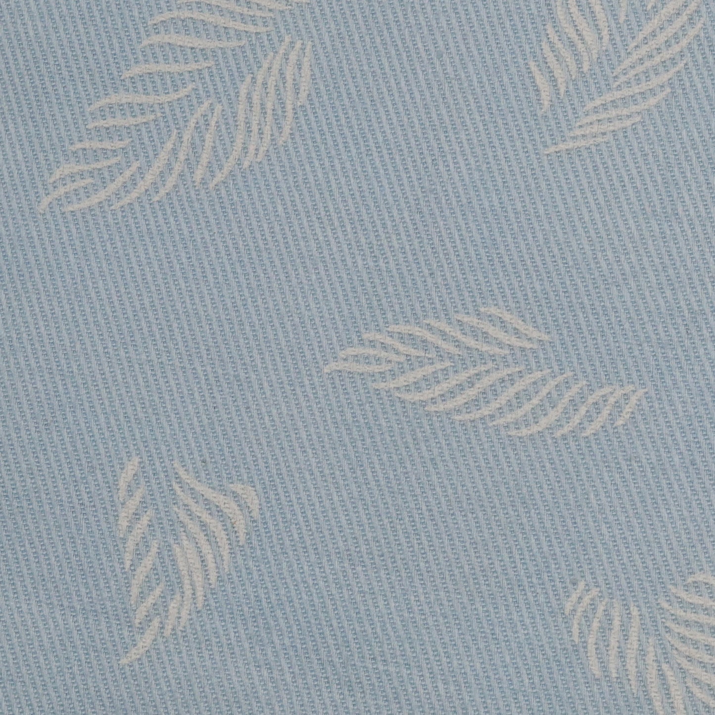 Pattern of leaves on a light blue background