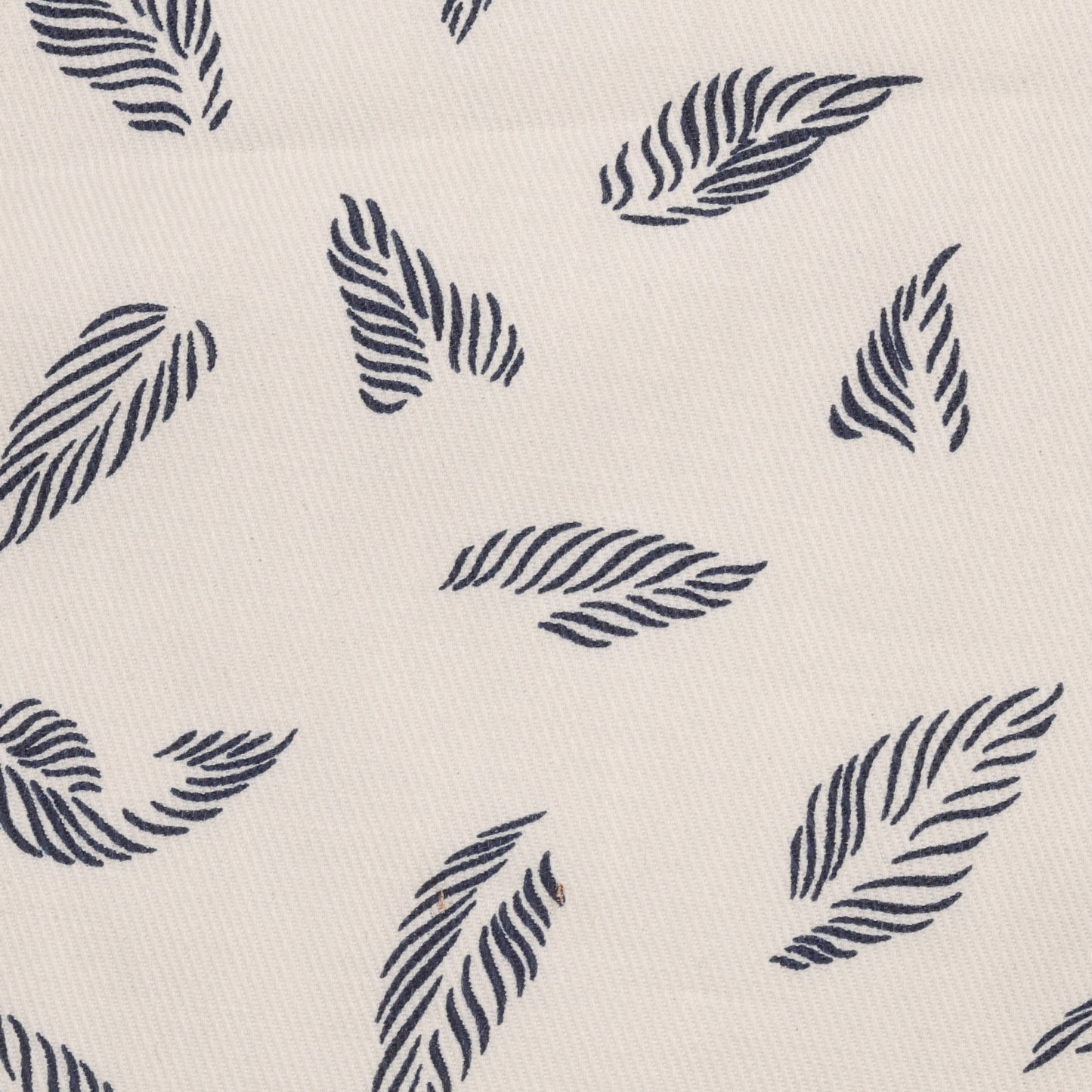 pattern of blue leaves on white fabric