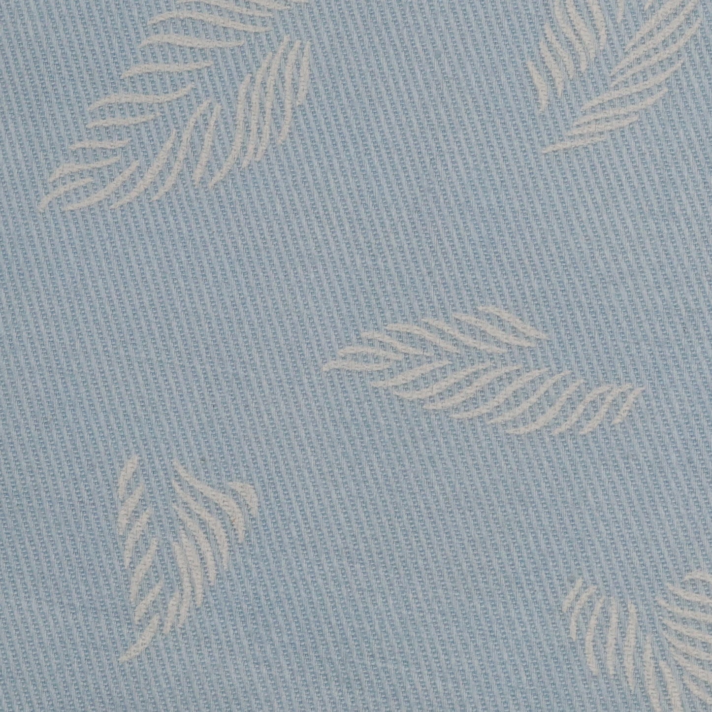 Pattern of leaves on a light blue background
